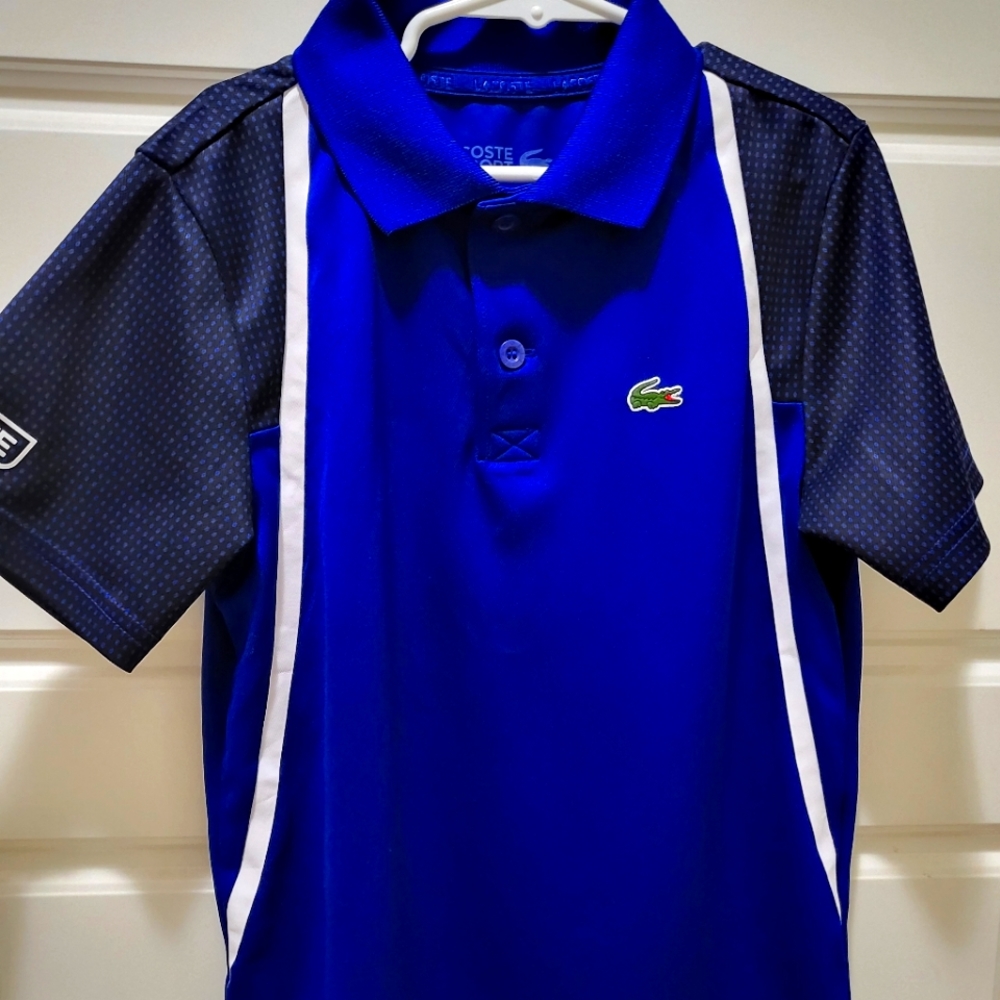 A boy's polo dry fit lacoste shirt. Size 10